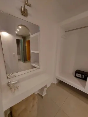 Ambience Suites Rooms Photos