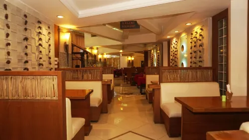 Pines Garden Resort Restauration Photos