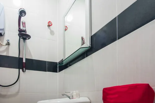 OYO 275 Senyum Inn Chambres Photos