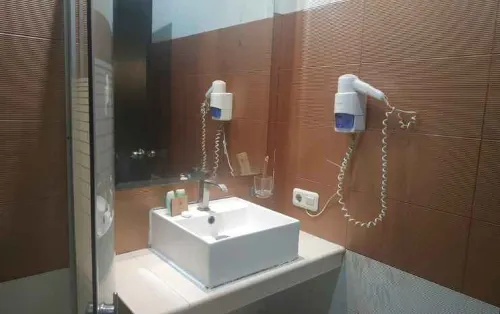 Savali Hotel Kamar Photos