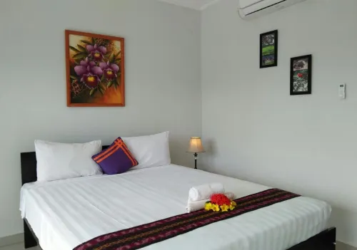 CF Komodo Hotel Kamar Photos