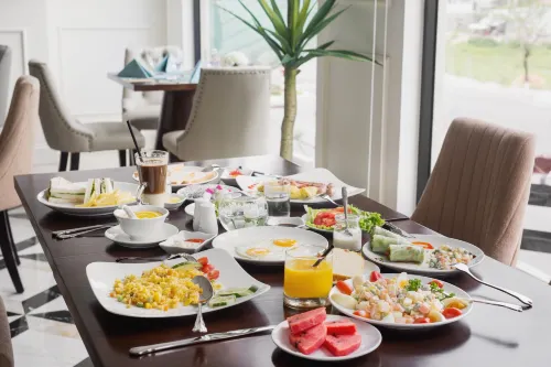 Adaline Hotel and Suite Ăn uống Photos