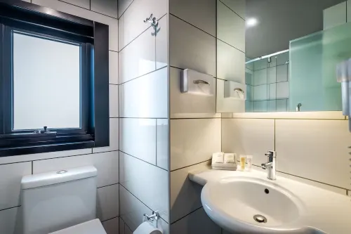 Essence Hotel Carlton Zimmer Photos