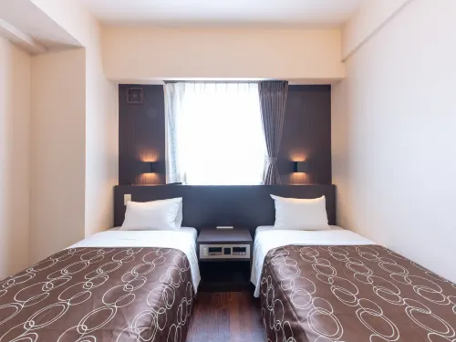 OYO City Hotel Higashimatsuyama Zimmer Photos
