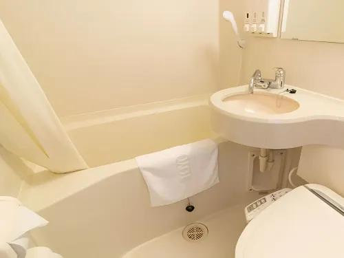 Toyoko Inn Kumamoto-Jyo Toricho Suji Chambres Photos
