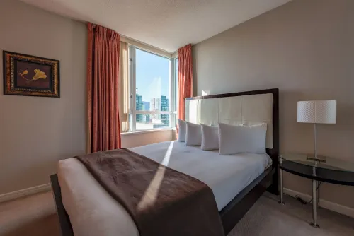 Carmana Hotel & Suites Rooms Photos
