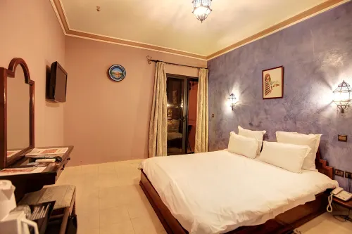 Amani Hotel Suites & Spa Rooms Photos
