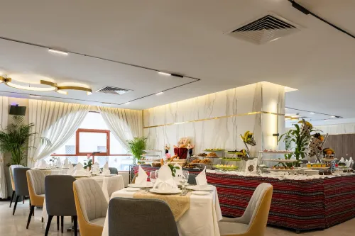 Emaar Elite Al Madina Hotel Питание Photos