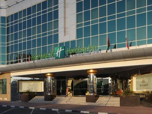 Sunday Hotel Holiday International Dubai Extérieur Photos