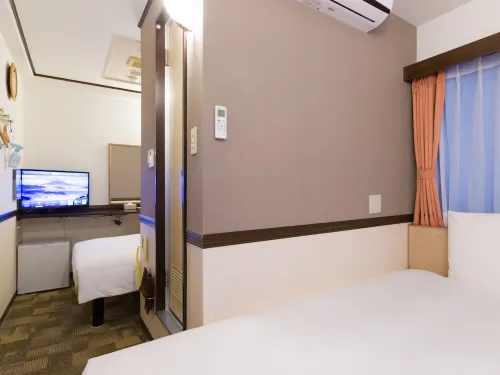 Toyoko Inn Shin-Osaka Chuo-Guchi Honkan Zimmer Photos