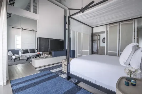 Four Seasons Resort Maldives at Landaa Giraavaru Zimmer Photos