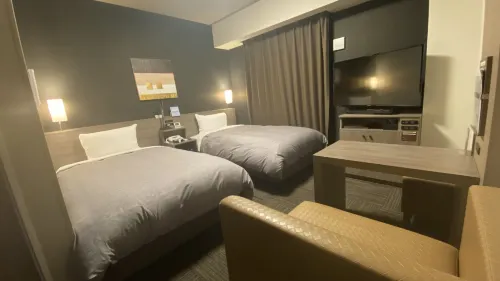 HOTEL ROUTE-INN UTSUNOMIYA YUINOMORI -LIGHTLINE YUINOMORI NISHI EKIMAE- Zimmer Photos