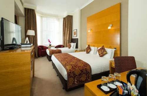 The Park City Grand Plaza Kensington Hotel Camere Photos
