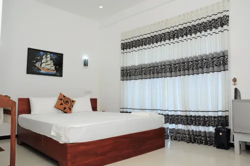 Sunstar Nilaveli Rooms Photos