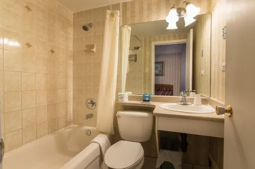 Canadas Best Value Inn Chinook Station Rooms Photos