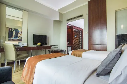 Grand Candi Hotel Rooms Photos