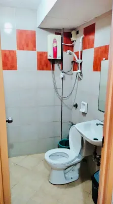 OYO 871 Herel Guest House Chambres Photos