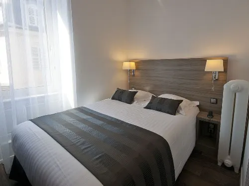 Hôtel le Grillon Chambres Photos
