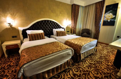 Golden Deluxe Hotel Chambres Photos