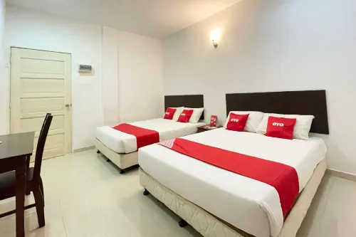 OYO 275 Senyum Inn Chambres Photos