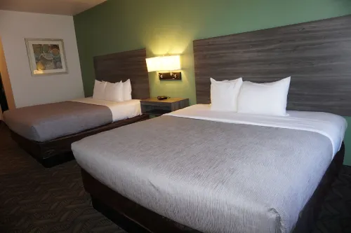 Quality Inn & Suites Airport West Rooms Photos