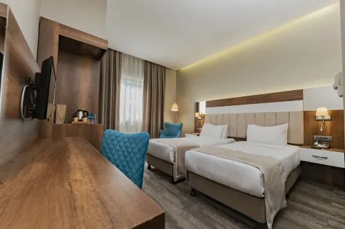 Vespia Hotel Rooms Photos
