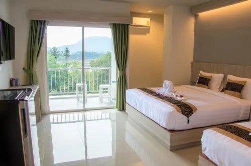 Carpio Hotel Phuket Kamar Photos