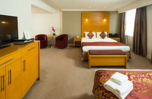 The Park City Grand Plaza Kensington Hotel Camere Photos