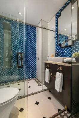 Carillon Boutique Hotel Rooms Photos