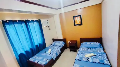 OYO 871 Herel Guest House Chambres Photos
