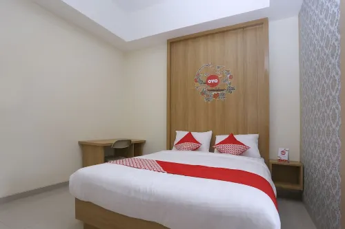 OYO 999 Garuda Guesthouse Chambres Photos