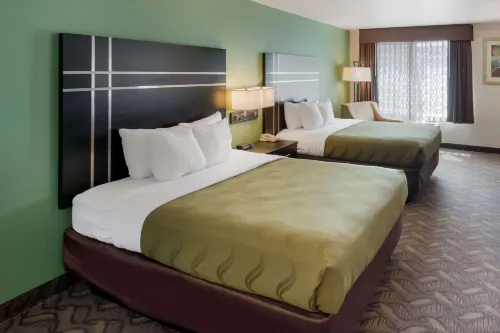 Quality Inn & Suites Airport West Rooms Photos