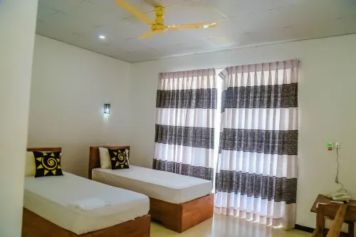 Sunstar Nilaveli Rooms Photos