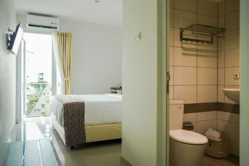 Aruuman Hotel Simpang Lima Kamar Photos