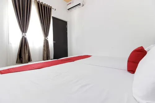 RedDoorz Near Sam Ratulangi Airport Manado Chambres Photos