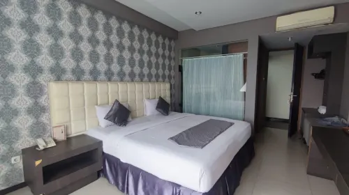 The Rizen Hotel Kamar Photos