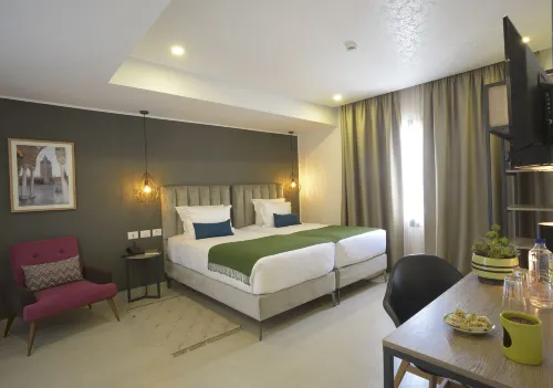 Maia Hotel Suites Rooms Photos