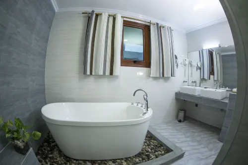 Triton Beach Hotel & Spa Chambres Photos
