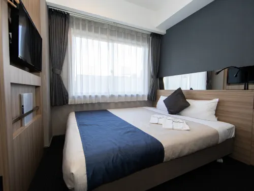 Quintessa Hotel Osaka Shinsaibashi Comic&Books Kamar Photos