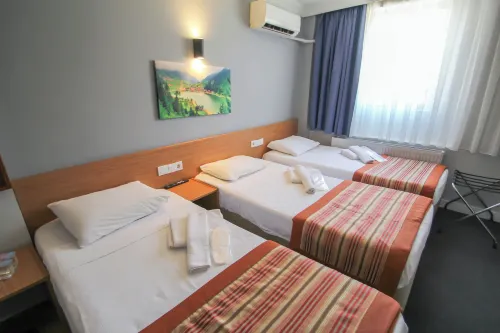 Grand Bella Palace Kamar Photos