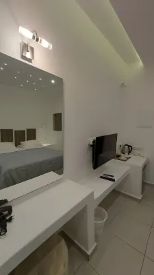Ambience Suites Rooms Photos