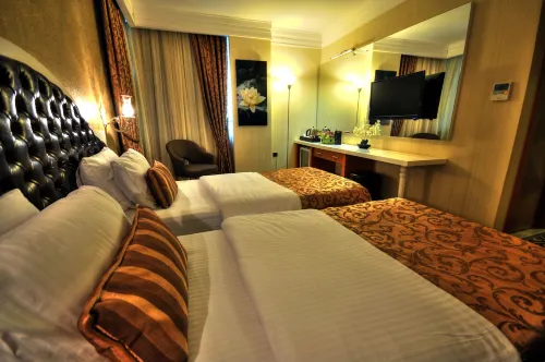 Golden Deluxe Hotel Chambres Photos