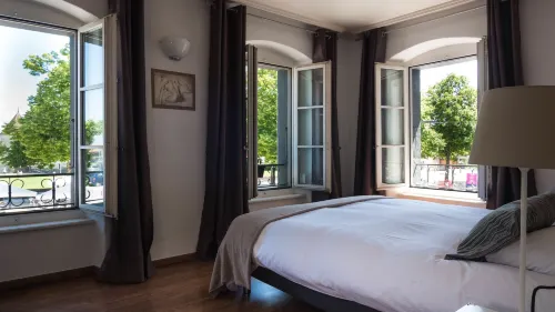 L'Hotel by Hostellerie du Chateau Zimmer Photos