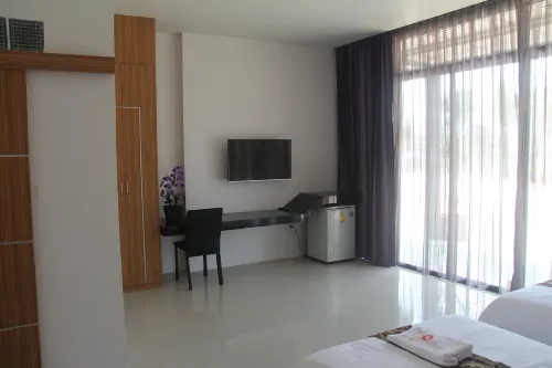 Tawan Anda Garden Hotel Chambres Photos
