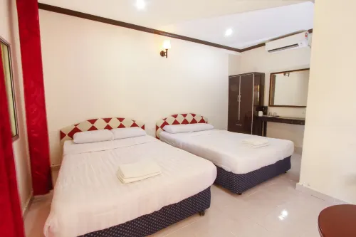 Tanjung Puteri Motel Chambres Photos