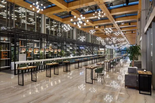 Nirvana Cosmopolitan Hotel - Convention & Sports Center Area Publik Photos