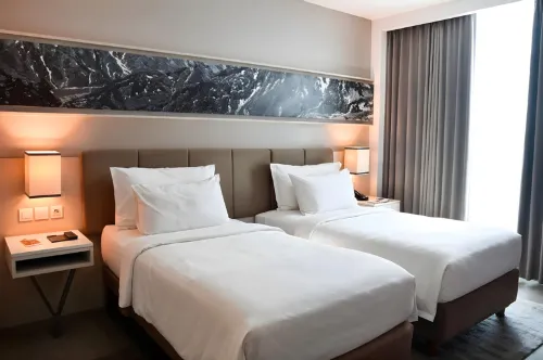 Swiss-Belhotel Jambi Chambres Photos