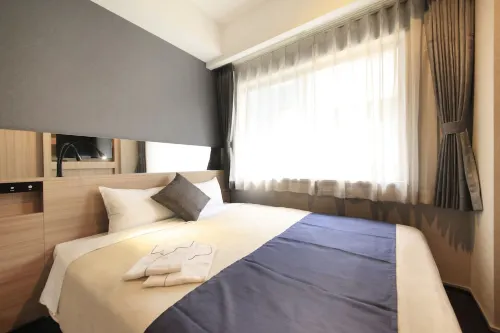 Quintessa Hotel Osaka Shinsaibashi Comic&Books Kamar Photos