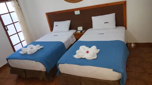 Hotel Coloma Galapagos Zimmer Photos