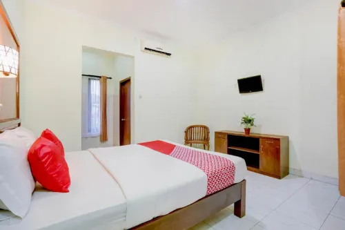 Teges Inn Kuta Camere Photos